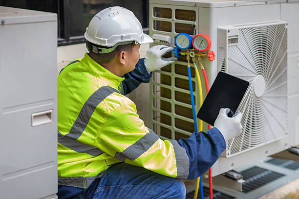 Professional Air Conditioning Repair technician working in Ceresco, MI